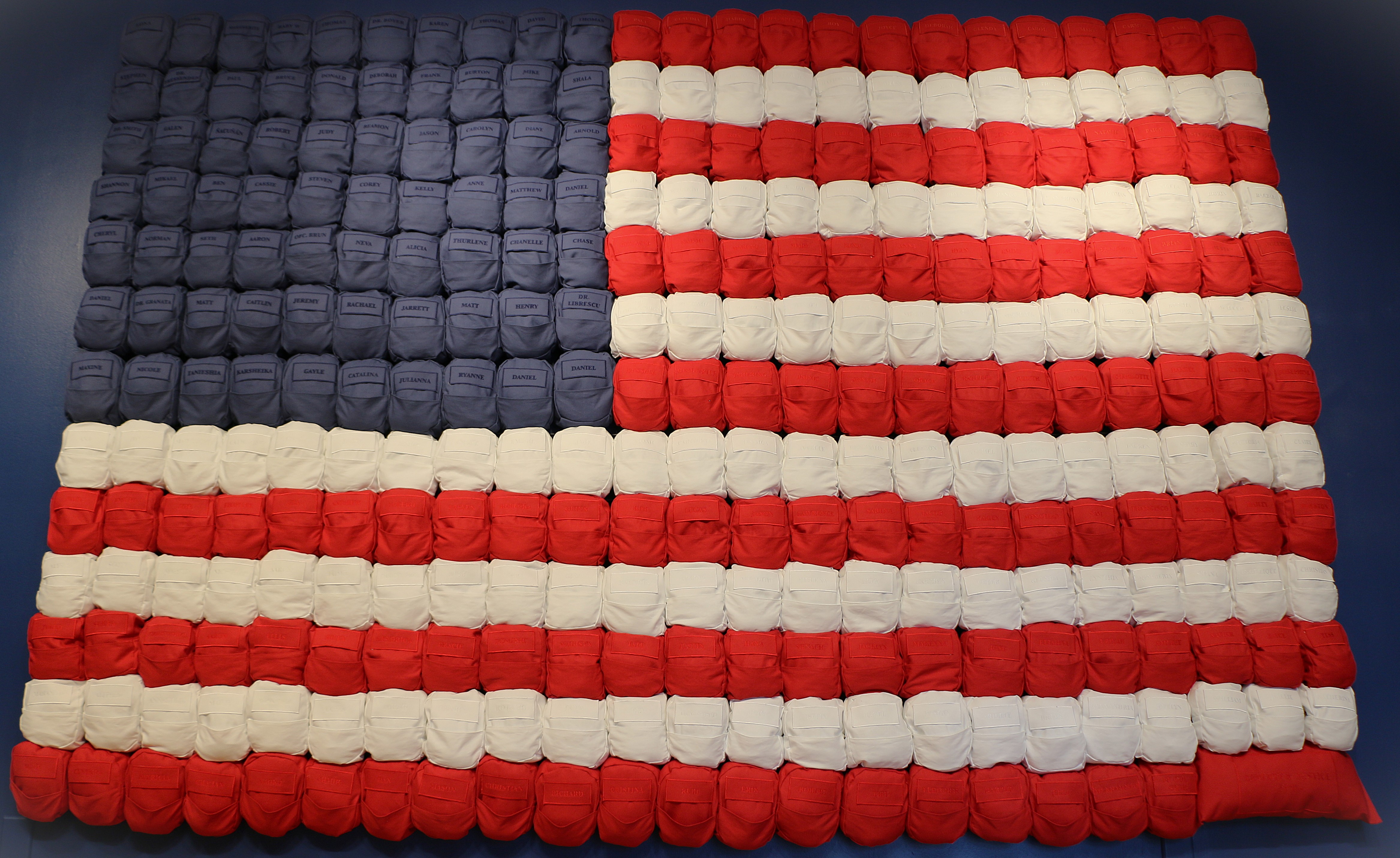 American Exceptionalism backpack installation arranged as an American flag